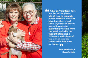 Volunteers Fran Matinale & Bonnie Katz holding puppy
